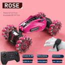 Carro de acrobacias com controle remoto rosa brilhante e rodas com pontas de tamanho grande.