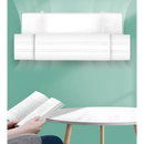 Sofá ou poltrona branca com linhas limpas e minimalistas.