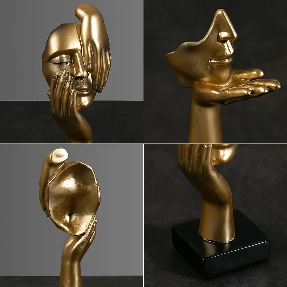 Escultura abstrata dourada com características faciais estilizadas e mãos em várias poses.