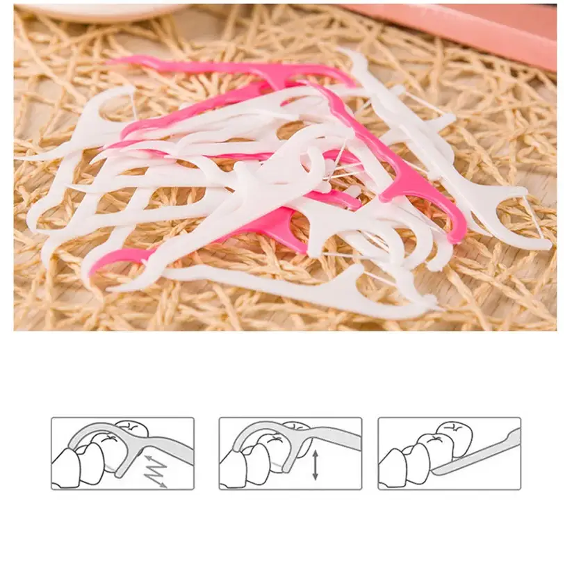 Uma pilha de elásticos brancos e rosa ou elásticos de cabelo.