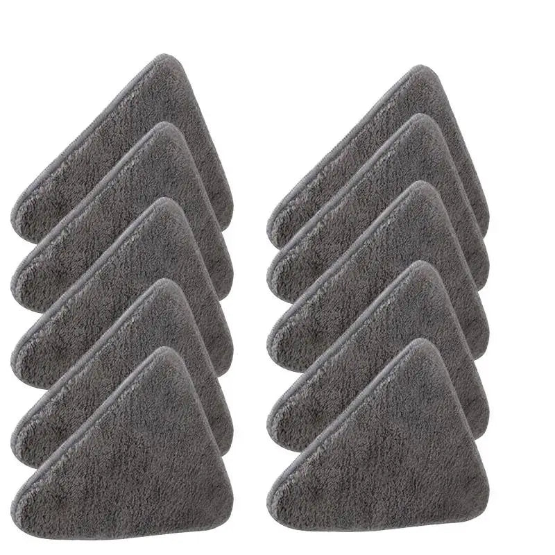 Conjunto de almofadas de limpeza triangulares de microfibra cinza dispostas em duas colunas.