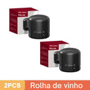 Dispositivo aerador de vinho cilíndrico preto com caixas de embalagem.